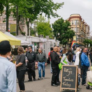 A crowd of people at the farmers market in Tacoma