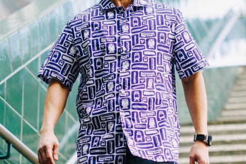 A collared short sleeve shirt with Sound Transit's different mode icons.