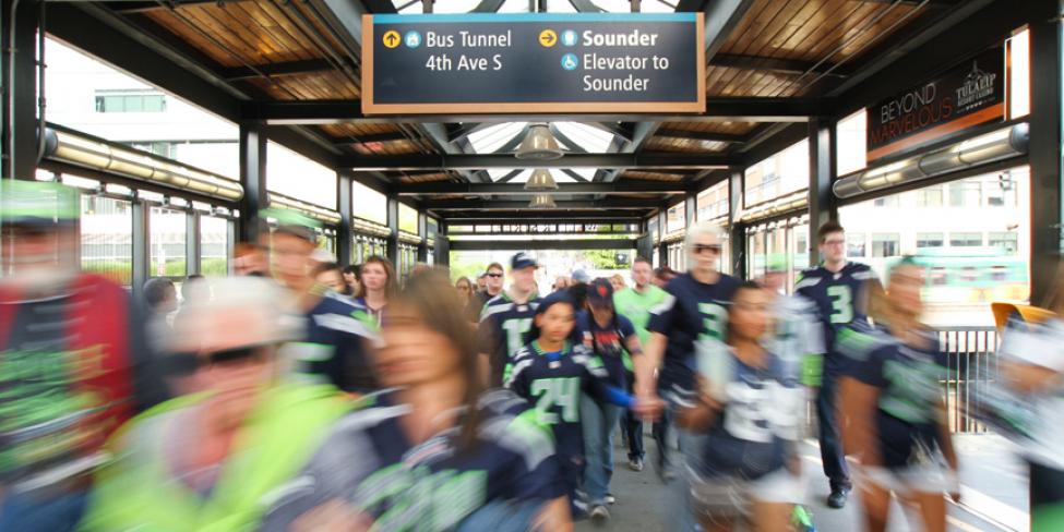 Seahawks fans leave King Street Station, heading to CenturyLink Field.