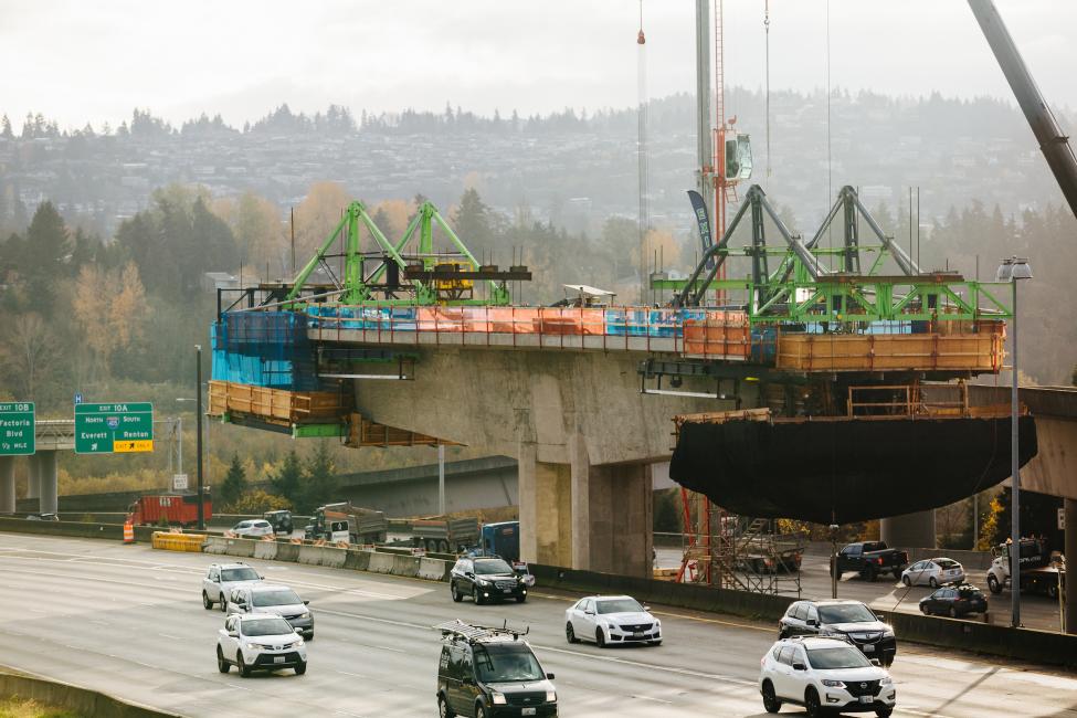 A view of the "traveler" atop one of the East Link columns as it builds a new bridge over the I-90 roadway.