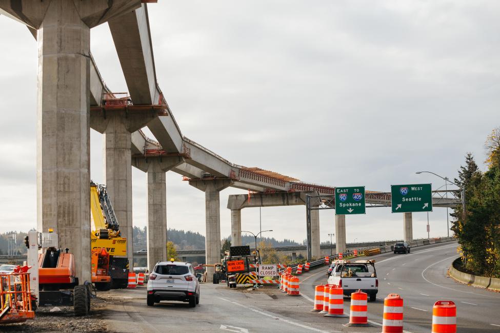 Columns and the elevated guideway rise above South Bellevue Way leading into the South Bellevue East Link light rail station. 