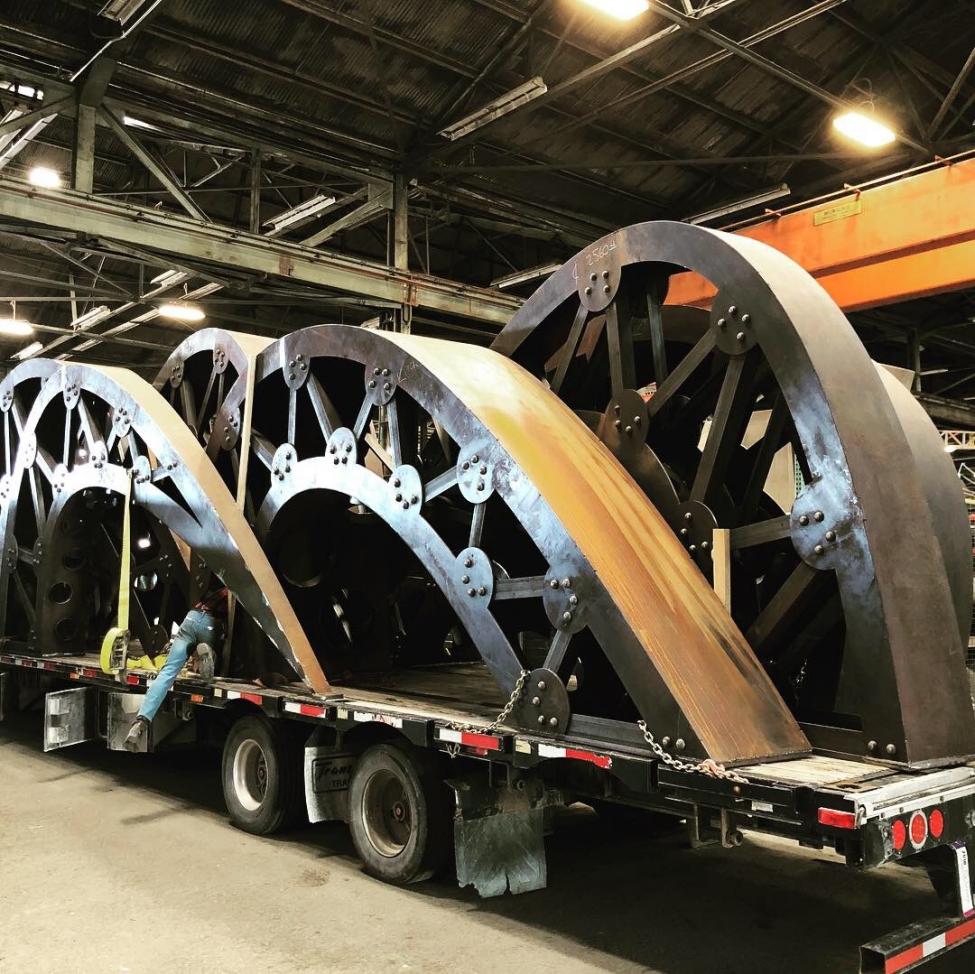 The steel sculpture Gertie's Ghost is loaded onto a special tractor trailer to be shipped to Tacoma