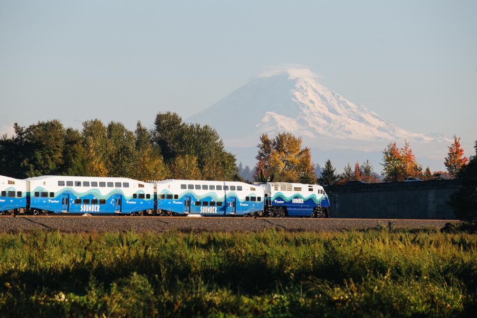 A Sounder commuter rail train with Mt. Rainier in the distance