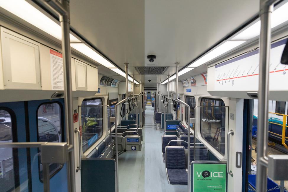 A look at a Link light rail train with LED lights on one side and the old lighting on the other side. The LED side is much more crisp and bright.