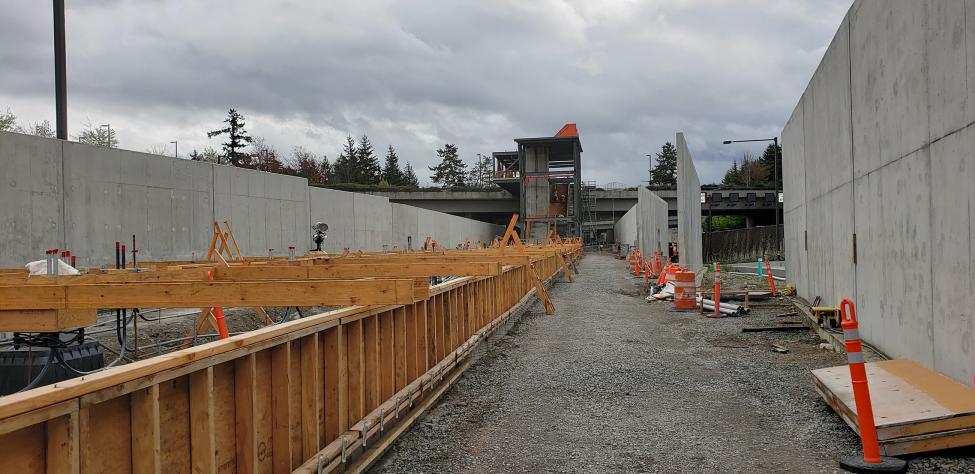 A view of platform construction and completed sound walls. Crews will begin pouring concrete for the platform in the coming weeks.