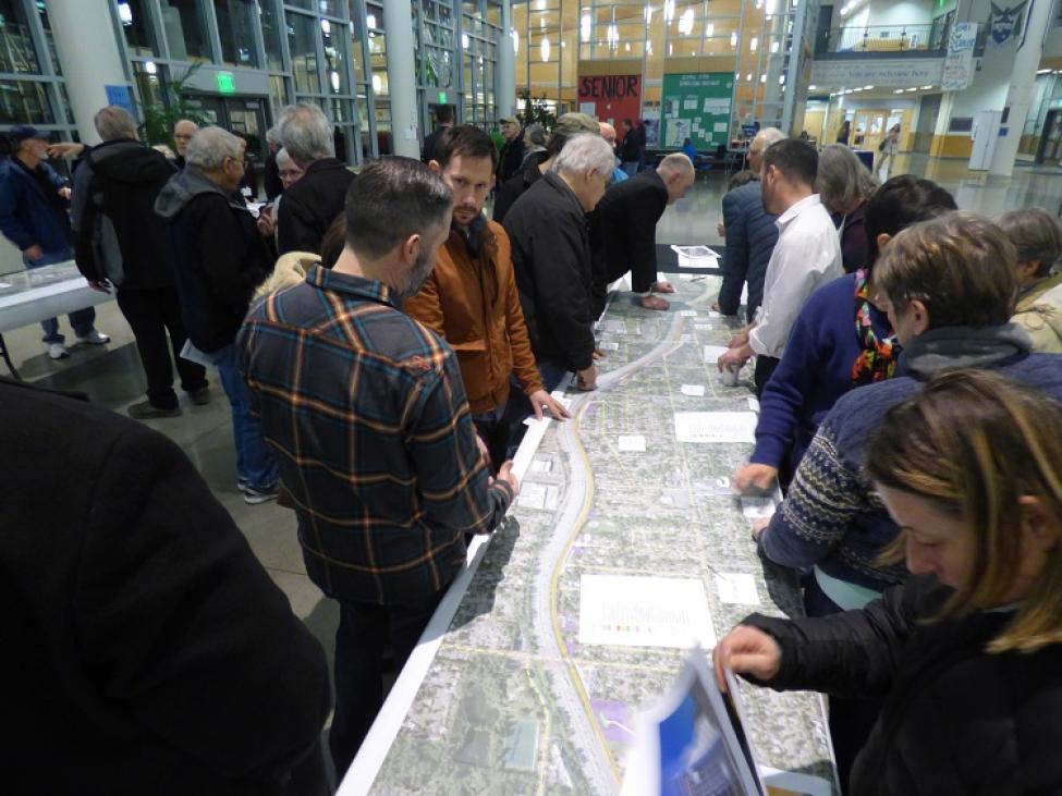 Lynnwood Link expansion people looking over map