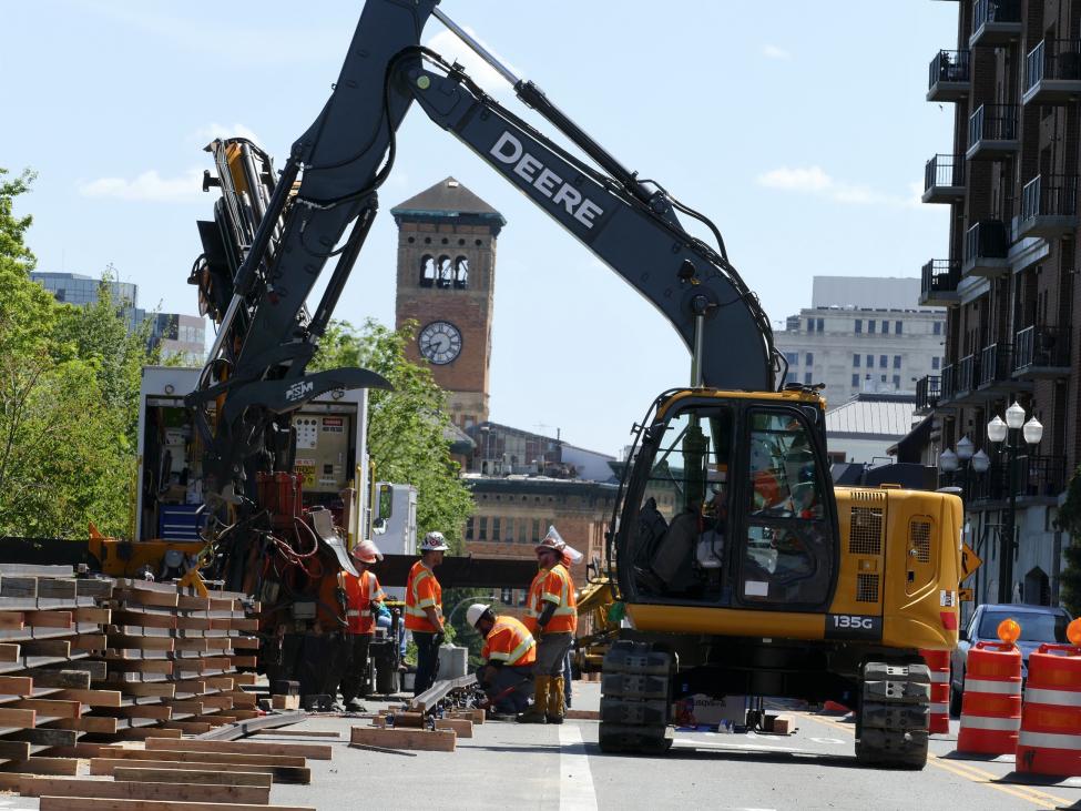 Contractors weld link tracks in Tacoma.