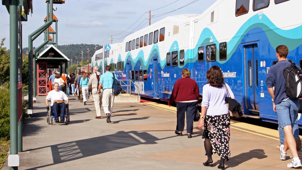 Passengers deboard a Sounder train at the Sumner Station.