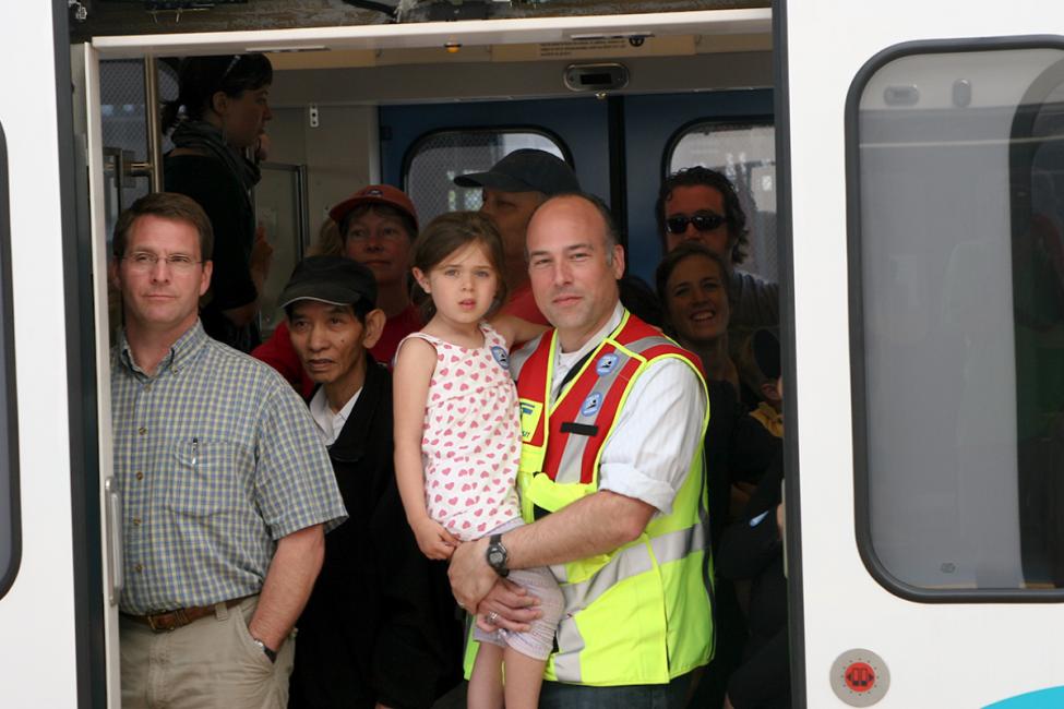 A father holds his 5-year-old daughter in his arms on Link's opening day.