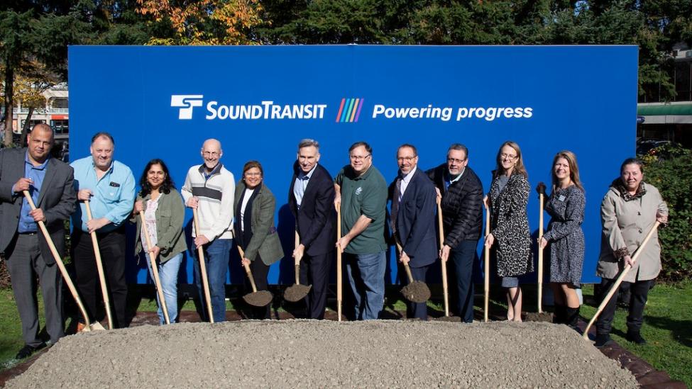 Officials break ground at a ceremonial ceremony to celebrate the start of the downtown Redmond Link Extension. 