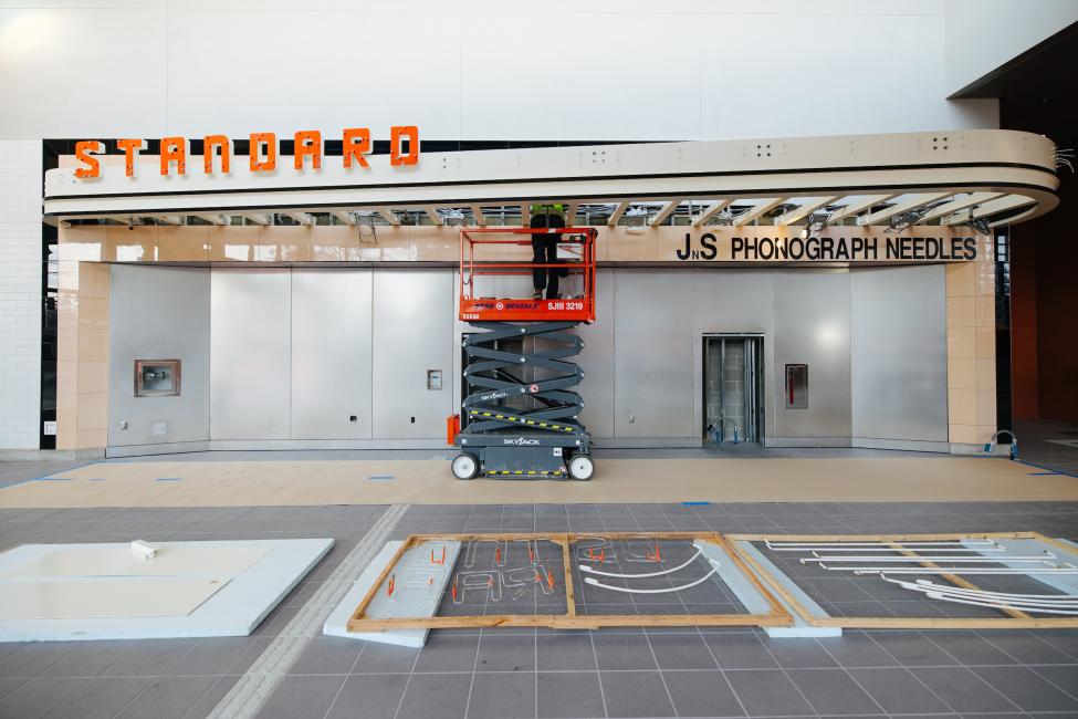 The south entrance of Roosevelt Station features the historic Standard Radio sign.