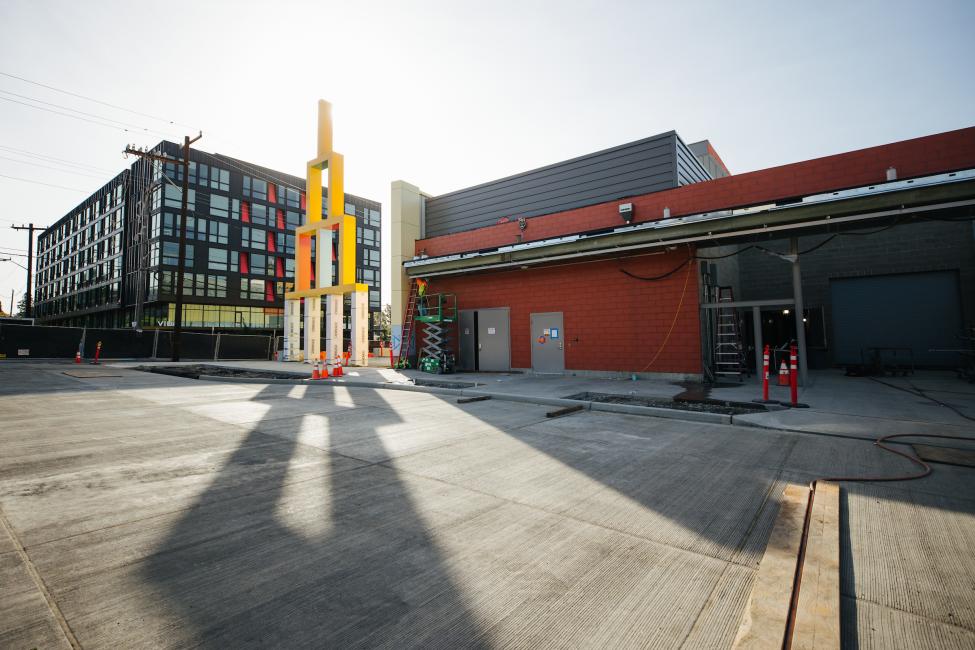 A large sculpture (called 'Building Blocks') sits outside the Roosevelt Station south entrance.