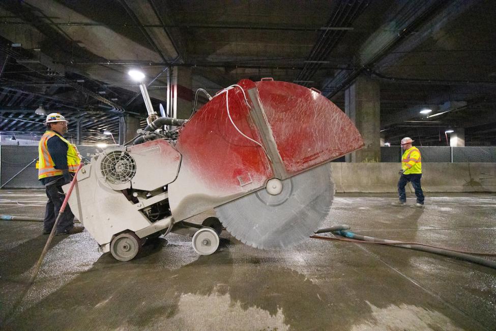 Machinery used to cut concrete sections from the International District/Chinatown Station resembles a giant saw. 