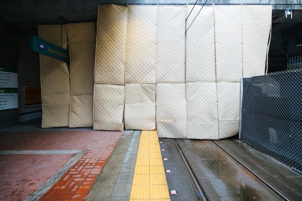 Sound blocking curtains hang at International District/Chinatown Station, where the Connect 2020 construction work is being done.