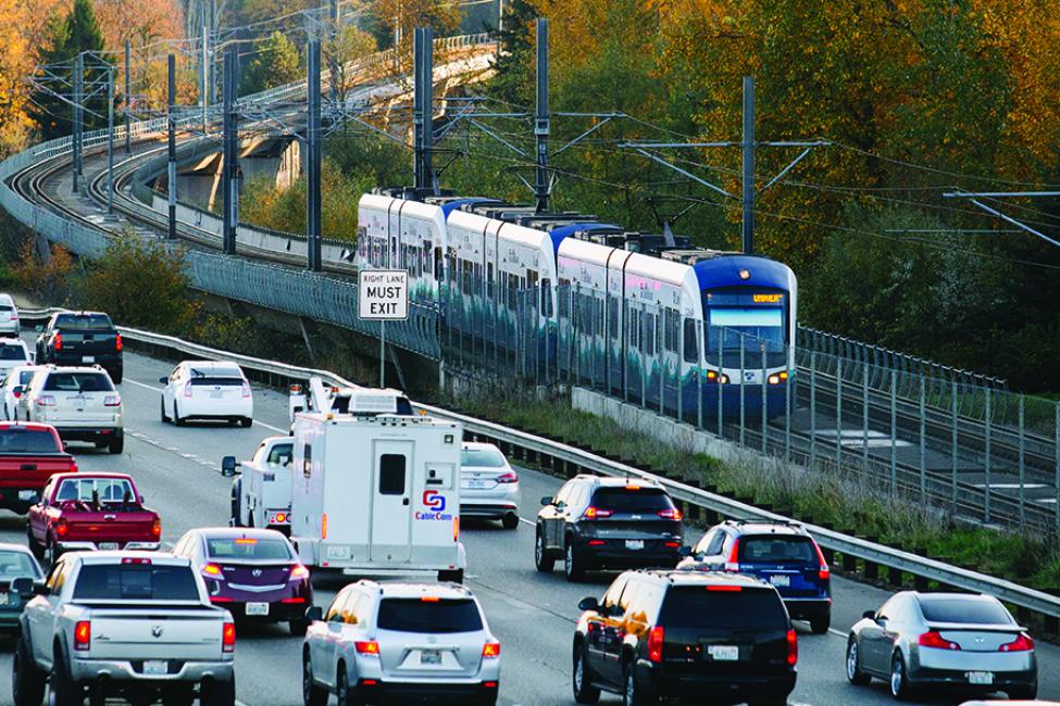 Link light rail passes traffic congestion on I-5.