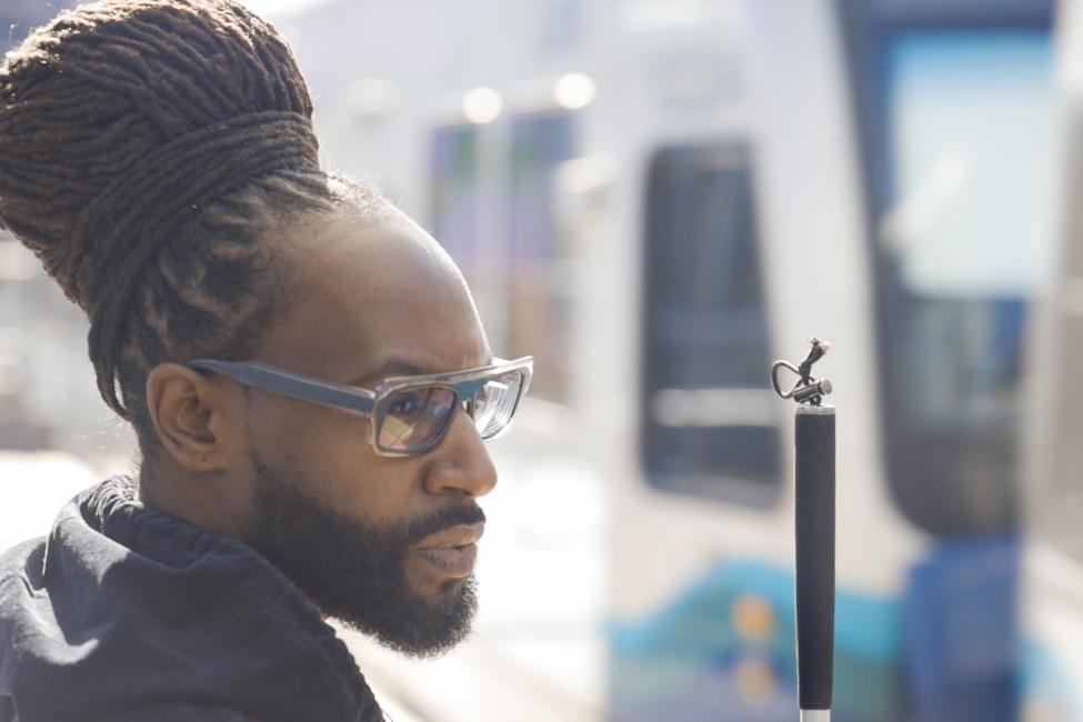 Melvin Freeman waiting on a Link light rail train