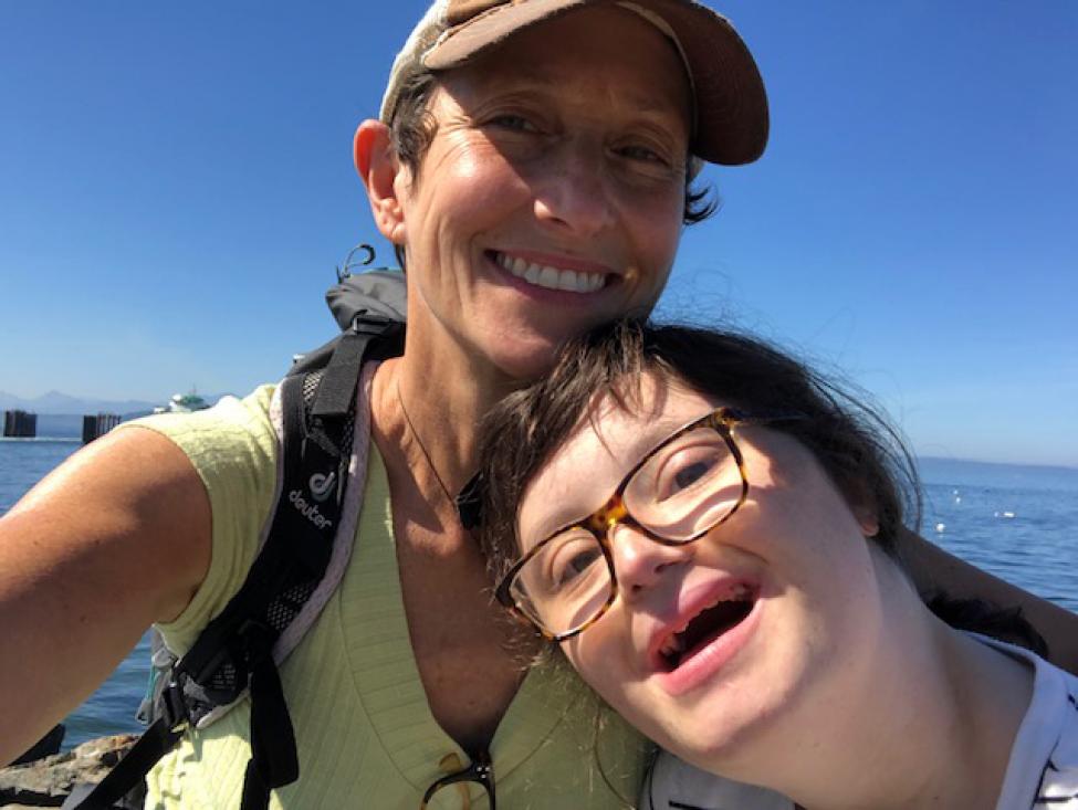 Marti Louther and her daugher smile for the camera while taking a selfie. 