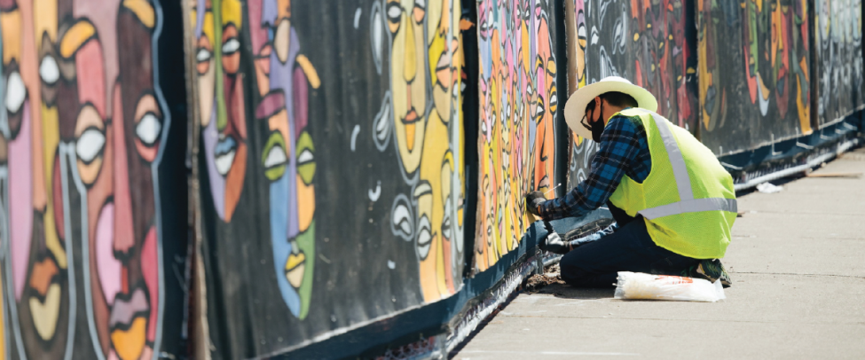 Federal Way Link Extension Dec 2020 Project update header image, Photo of a man painting a mural