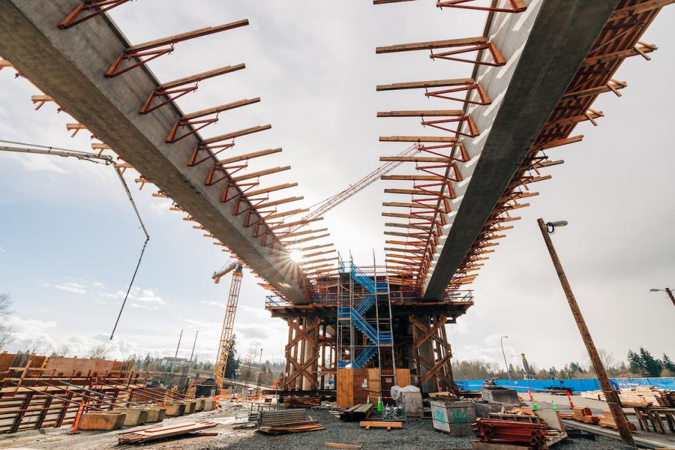 Looking up at the elevated guideway where trains will enter the Lynnwood City Center Station's elevated platform. 