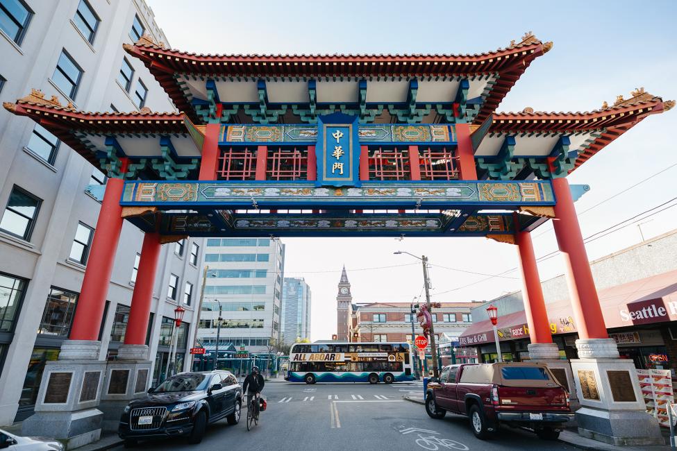 A Sound Transit Express bus passes in front of the Historic Chinatown Gate in the Chinatown-International District neighborhood in Seattle.