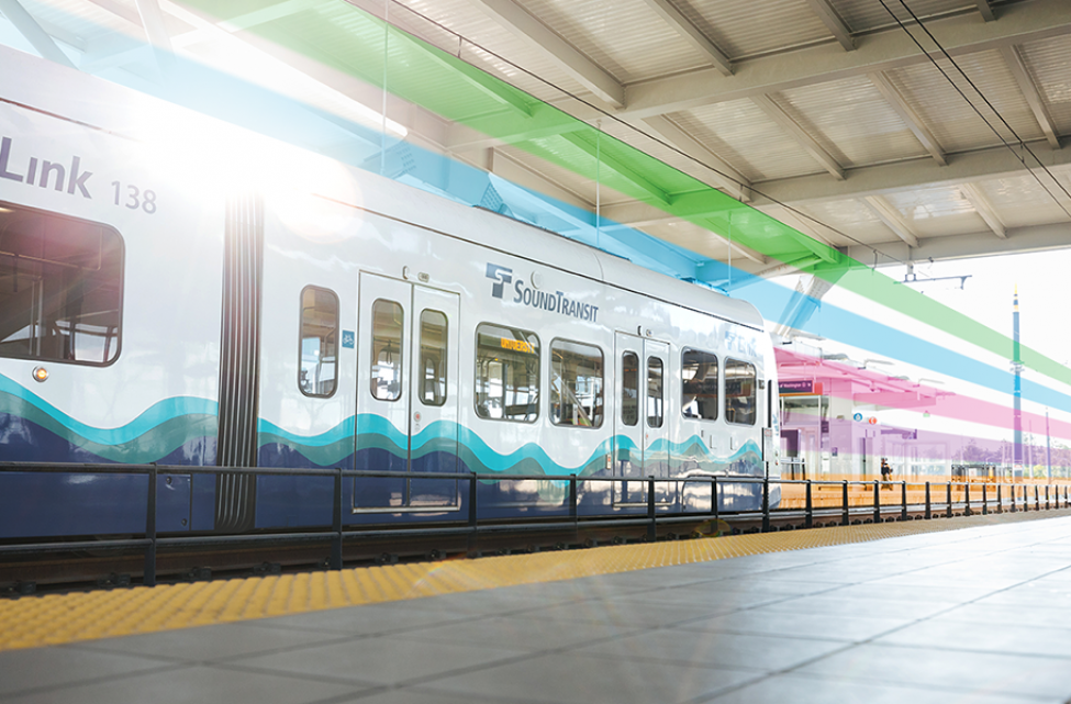 A photo illustration of a Link light rail train with colored lines like a map overlayed.
