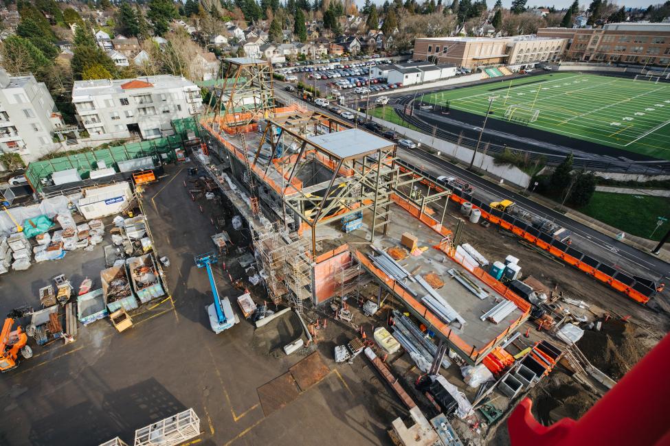 Looking down at Roosevelt Station while it was still in construction, with the high school football field visible to the right.