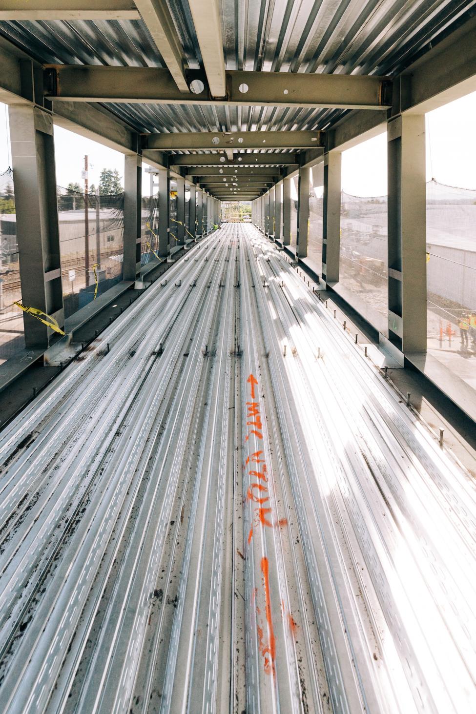 A view from inside the new pedestrian bridge looking east from the garage.