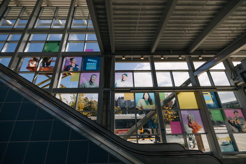 Photos are installed on a glass wall at Northgate Station.