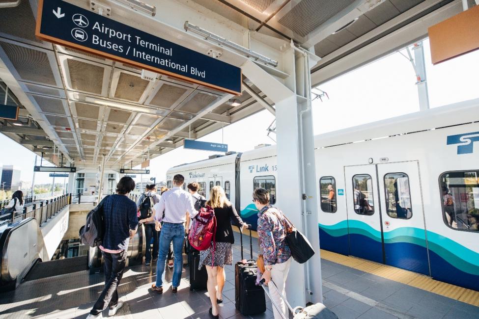 Photo of passengers exiting the train at Link Light Rail SeaTac Airport Station