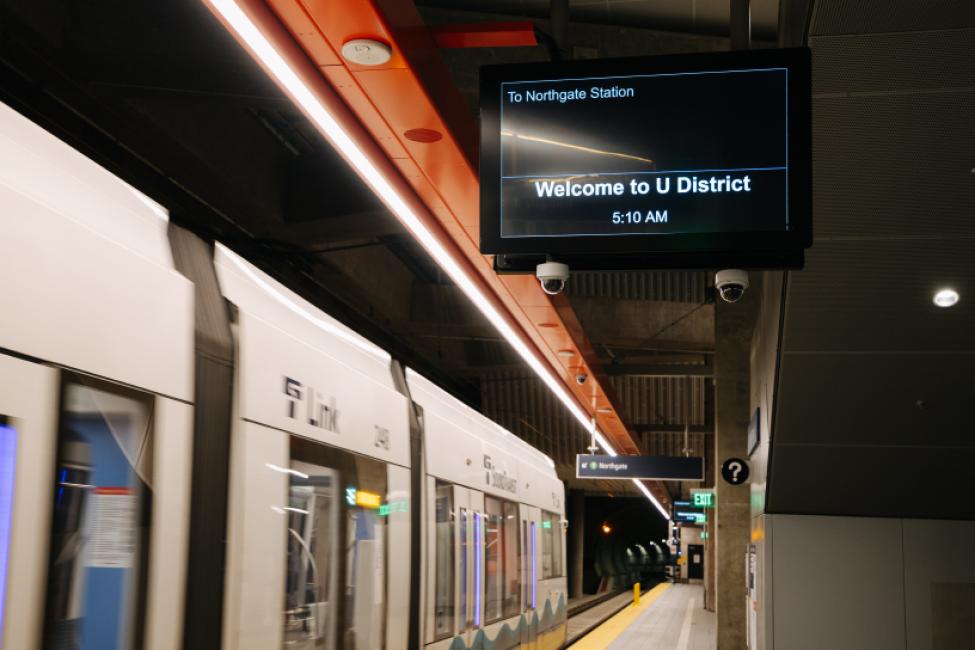 A mostly-blank digital sign at a Link station platform.