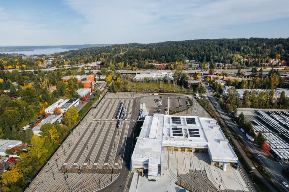 Looking down from a drones-eye view of the Operations and Maintenance Facility East featuring rows of train tracks that will be filled with light rail cars as they're delivered.