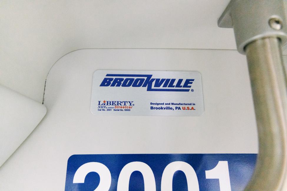 The logo of Brookville Equipment Corporation inside the new vehicle.