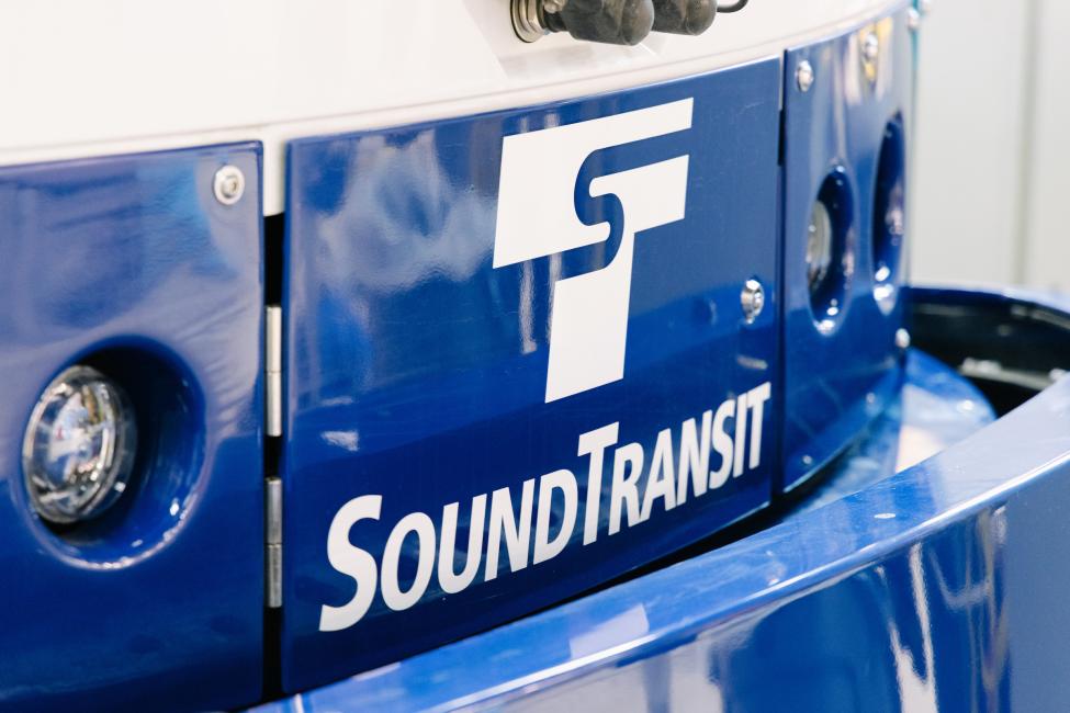 A close up of the Sound Transit logo on the front of the new Tacoma Link vehicle.