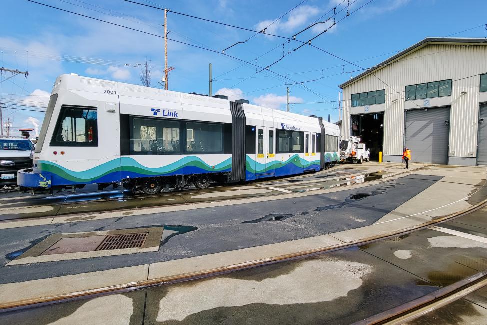 A Tacoma Link vehicle pulls into the OMF. 