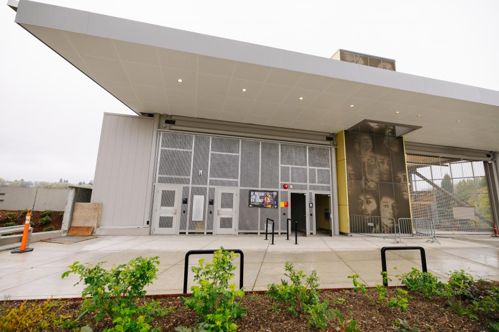 The entrance of Judkins Park Station, with a mural featuring Jimi Hendrix.