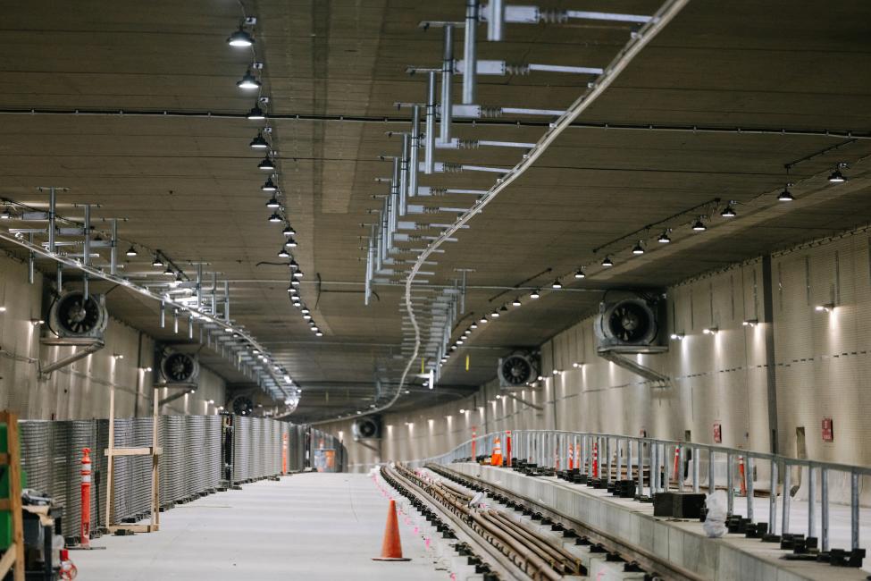 Looking into the I_90 tunnel, where rail and OCS equipment is being installed.