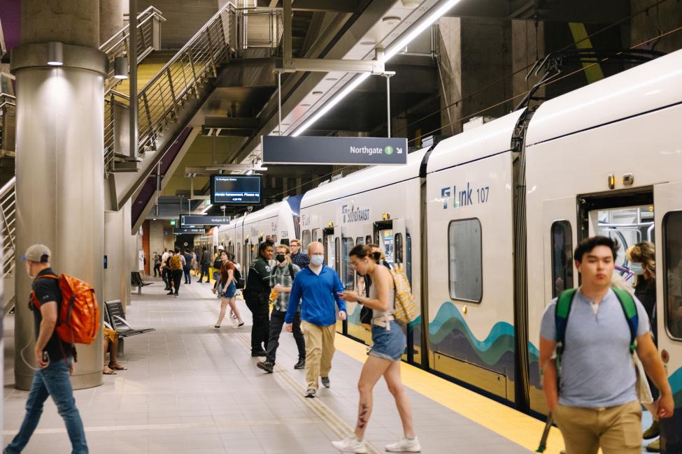 Passengers get on and off the train at Roosevelt Station. 