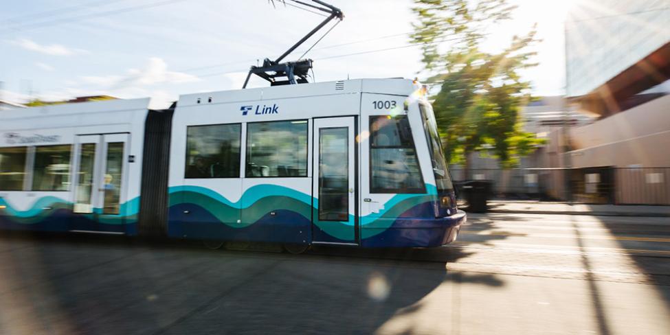 A T Line train moves through the city of Tacoma.