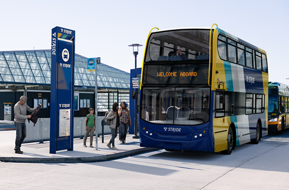 A rendering of a Stride bus at a stop.