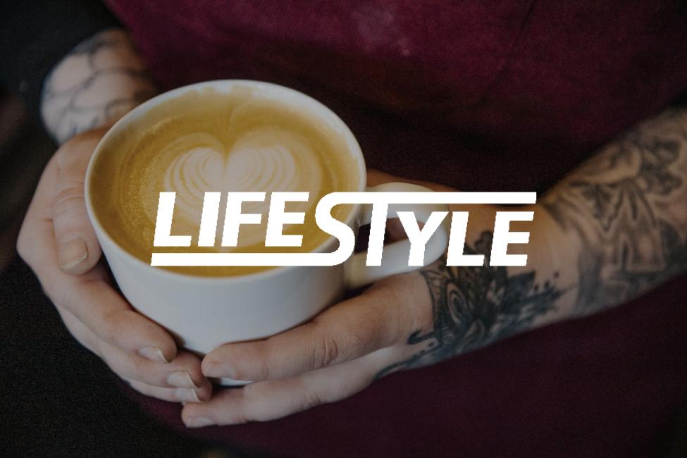 The LifeStyle logo with a background image of a person holding a cup of coffee.