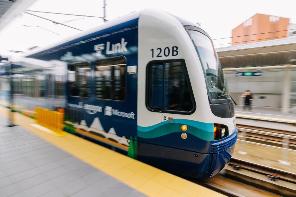 A train wrapped in a commemorative 2 Line ad at Bellevue Downtown Station