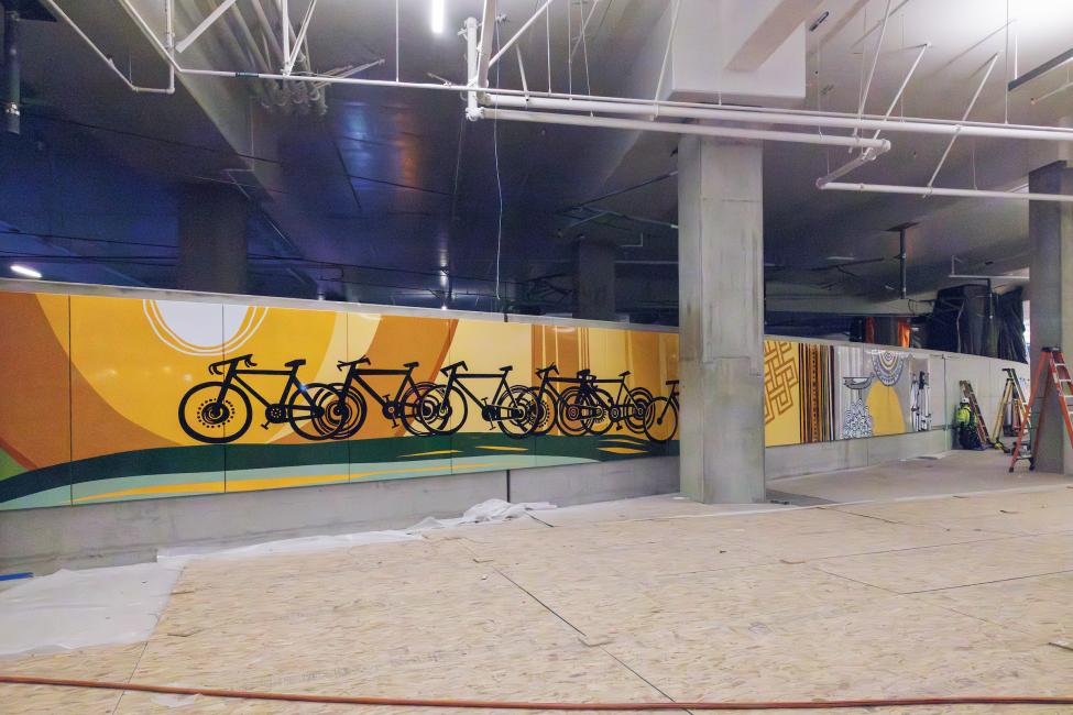 Yeggy Michael's artwork printed on porcelain enamel and installed at the Marymoor Village Station