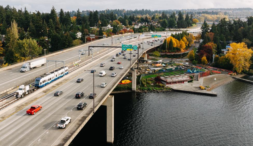 A train is pulled over the bridge between Mercer Island and Bellevue during light rail train testing
