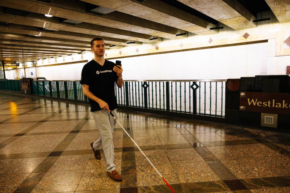 Person testing GoodMaps in Sound Transit station
