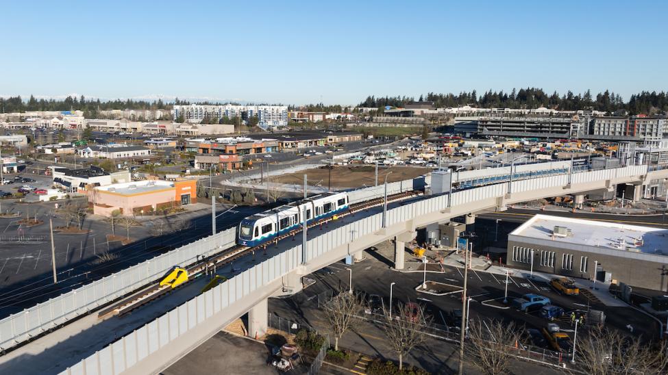 A one-car Link train on the elevated alignment for Link light rail in Federal Way.