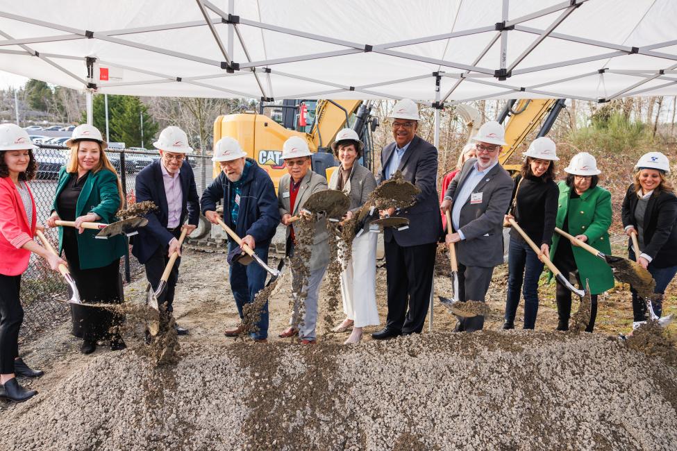 Speakers and other VIPs break ground at the groundbreaking ceremony for the Spring District Station transit-oriented development (TOD), hosted by BRIDGE Housing on February 27, 2025.