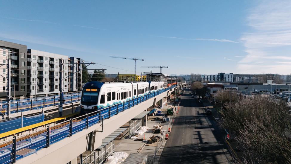 A Link train runs on the tracks near Downtown Redmond Station.