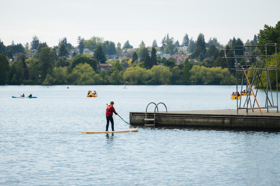 SUP by a dock at Green Lake