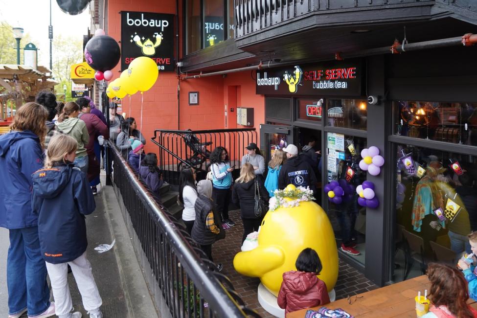 A long line outside a bubble tea shop in the U District neighborhood of Seattle