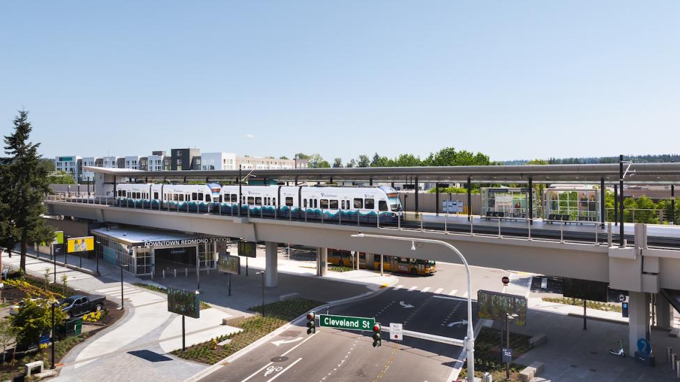 A Link train at Downtown Redmond Station on a sunny day